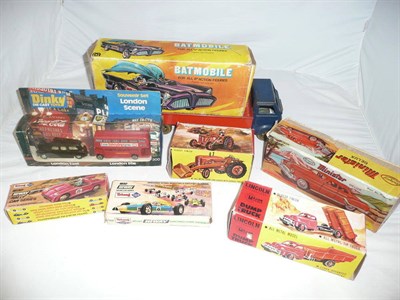 Lot 147 - Seven Boxed Toy Vehicles, comprising a plastic Batmobile by National Periodical Publications...