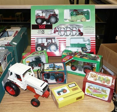 Lot 158 - Eleven Boxed Tractors, comprising four Siku, four Kovap, a Hanomag and two Scaledown models;...