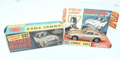 Lot 191 - A Boxed Corgi 'James Bond's' Aston Martin DB5 No.261, in gold, with spoked wheels, two...