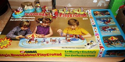 Lot 205 - A Boxed Corgi Magic Roundabout Playground No.853, complete with train, carousel, see-saw,...