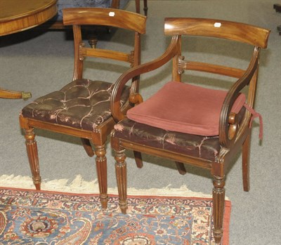 Lot 1526 - A Set of Eight George IV Mahogany Dining Chairs, each concave top rail above reeded uprights...