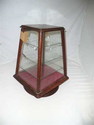 Lot 220 - A Revolving Mahogany Shop Display Cabinet, of tapered rectangular form, with glazed panels to...