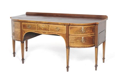 Lot 1527 - A Late George III Mahogany and Satinwood Banded Breakfront Sideboard, circa 1820, the top with...