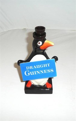 Lot 225 - A Carltonware Draught Guinness Ceramic Penguin Lamp Base, modelled as a standing penguin...