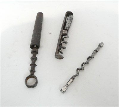 Lot 235 - Three Small 19th Century Steel Corkscrews, comprising a polished steel peg and worm, a picnic...