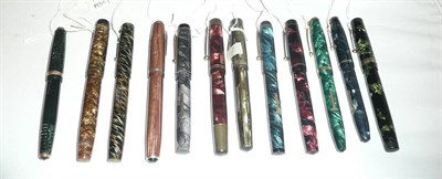 Lot 243 - Twelve Vintage Coloured Fountain Pens, including a Valentine in gold pearl, Blackbird in...