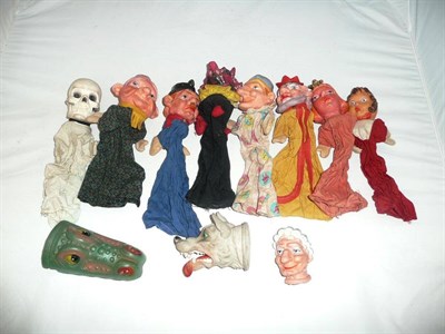 Lot 126A - Ten Punch & Judy Glove Puppets, with rubber heads and cloth bodies, in a suitcase