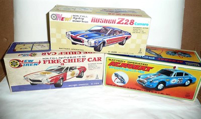 Lot 80 - Three Boxed Japanese Tinplate Battery Operated Cars:- Fire Chief Car by Taiyo; Rusher Z28 Camaro by