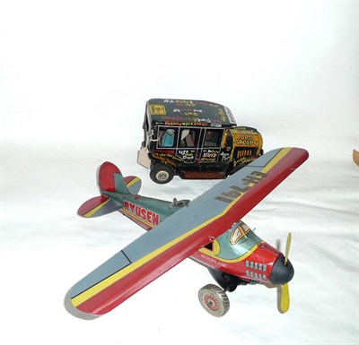 Lot 82 - A Marx Tinplate Friction Drive 'Old Jalopy' Novelty Car, in black, with humourous graffiti,...
