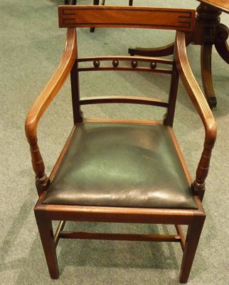 Lot 1545 - A Set of Seven Regency Mahogany Dining Chairs, the curved ebony strung top rail above three...