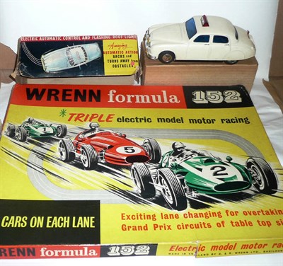 Lot 125 - A Boxed Wrenn Formula 152 Triple Electric Motor Racing Set, containing two cars, controllers,...