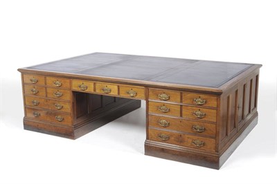 Lot 1546 - A Late Victorian Walnut Partners Desk, circa 1890, the rectangular top with moulded edge and...