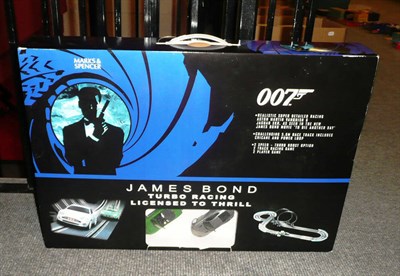 Lot 140 - A Boxed James Bond Turbo Racing Set by Carrera; a Boxed Revell 1:12 Scale 54 Mercedes 300 SLR;...