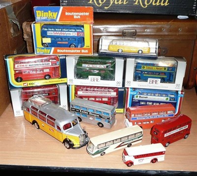 Lot 147 - Fourteen Diecast Buses, including a boxed Dinky Routemaster Bus No.289, in purple with 'Esso Safety