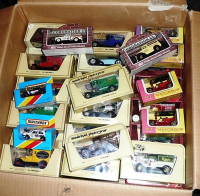 Lot 175 - Thirty Three Boxed Matchbox Models of Yesteryear, window boxes, including cars and commercials,...