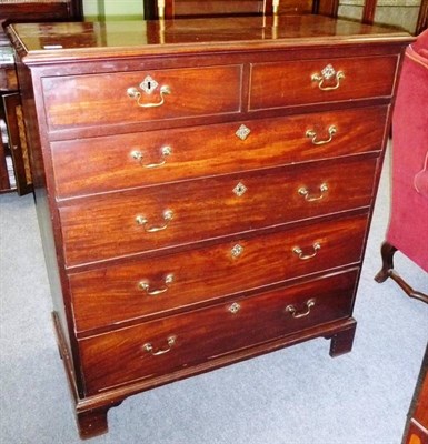 Lot 1554 - A George III Mahogany Chest of Drawers, the rectangular top with moulded edge above two short...