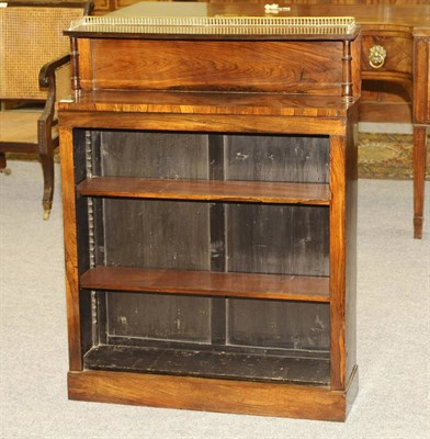 Lot 1558 - A Regency Rosewood Dwarf Bookcase, the superstructure with three-quarter pierced brass baluster...