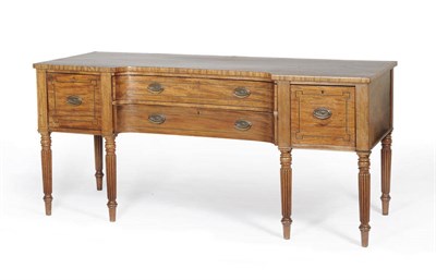 Lot 1564 - A George IV Mahogany and Ebony Strung Sideboard, of concave form, the rectangular top with...