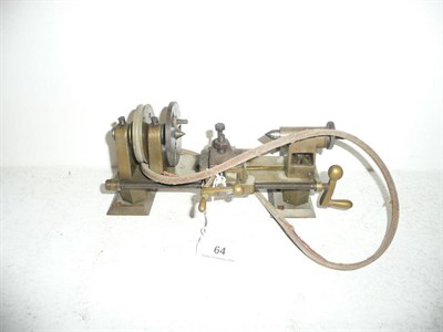 Lot 64 - A Small Brass and Steel Watchmakers Belt Driven Lathe, length 24cm.
