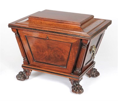 Lot 1568 - A Regency Mahogany Wine Cooler, of waisted tapering form, the hinged lid opening to reveal a...