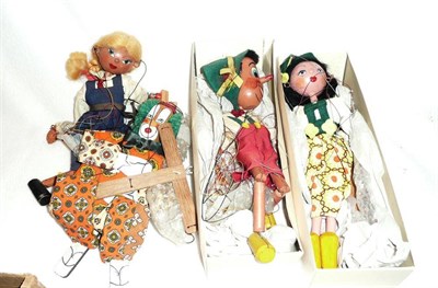 Lot 128 - Two Boxed Pelham Puppets - Pinocchio and Peggy Sue; Unboxed Pelham Schoolgirl and another...