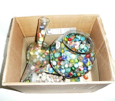 Lot 166 - A Collection of Mixed Marbles, in three glass jars.