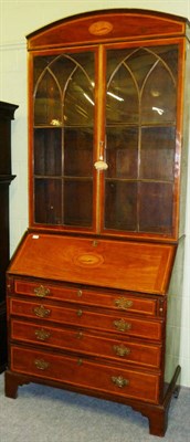 Lot 1575 - A George III Mahogany, Satinwood Banded and Ebony Strung Bureau Bookcase, the broken pediment...