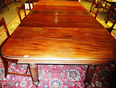 Lot 1577 - A Mahogany Extending Dining Table, mid 19th century, the rounded rectangular top raised on...