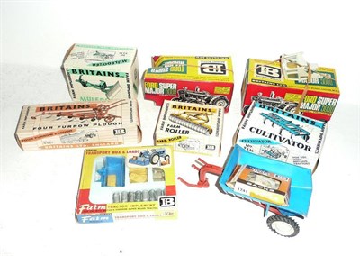 Lot 195 - A Collection of Boxed Britains Farm Vehicles and Implements, including two Ford Super Major...