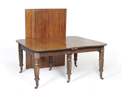 Lot 1579 - A George IV Mahogany Dining Table, the rounded rectangular top with moulded edge, raised on six...