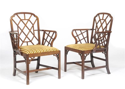 Lot 1580 - A Pair of George III Mahogany Cockpen Open Armchairs, in the Chinese Chippendale style, the moulded