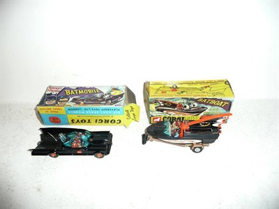 Lot 218 - A Boxed Corgi Rocket Firing Batmobile No.267, with gloss black body, red bat logo on doors and...