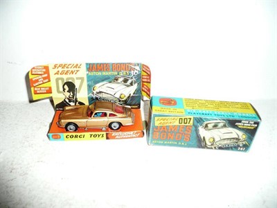 Lot 224 - A Boxed Corgi James Bond's Aston Martin D.B.5 No.261, in gold with passenger, secret...