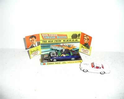 Lot 227 - Two Boxed Corgi TV Related Vehicles:- Man from U.N.C.L.E. Thrush Buster No.497, in metallic purple