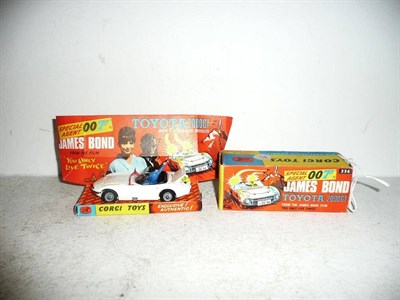 Lot 242 - A Boxed Corgi James Bond's Toyota 2000GT No.336, in white, with red flag, driver and passenger,...