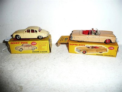 Lot 266 - Two Boxed Dinky Cars:- Jaguar 3.4 Saloon No.195, in cream with red interior and spun hubs;...