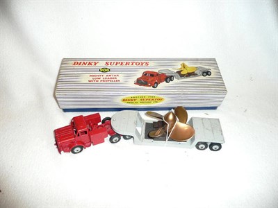 Lot 271 - A Boxed Dinky Supertoys "Mighty Antar Low Loader with Propeller" No.986, with red cab, grey low...