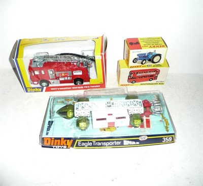 Lot 274 - Four Boxed Dinky Vehicles:-  Leyland 384 Tractor No.308, in metallic red with driver; Space...