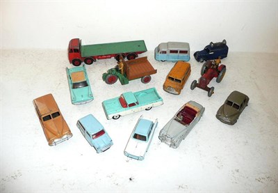 Lot 275 - Thirteen Early Dinky Vehicles, including Foden Eight Wheel Flat Back Truck, with red cab and...