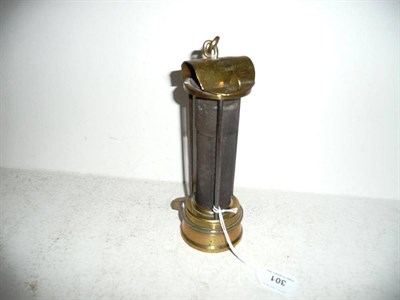 Lot 301 - An Early Miners Brass Davy Lamp by Laidler, Durham, No.143, with hinged hood, iron gauze and...