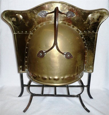 Lot 1622 - An Arts and Crafts Brass and Wrought-Iron Fire Guard, the shaped hood with a heart motif in...