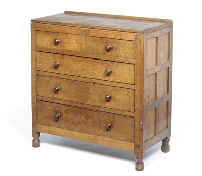 Lot 1635 - A Robert "Mouseman" Thompson Panelled Oak Chest of Drawers, dated 1935, with raised upstand...