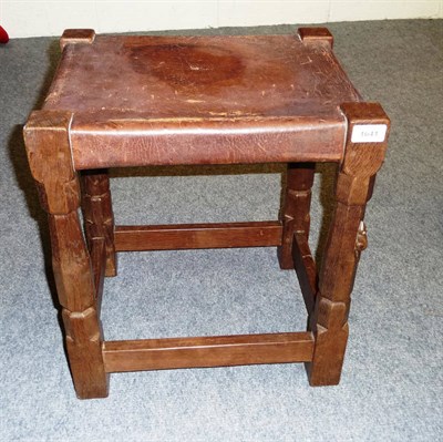 Lot 1641 - A Robert "Mouseman" Thompson Dressing Table Stool, on four octagonal legs joined together by...