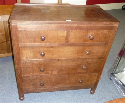 Lot 1642 - A Robert "Mouseman" Thompson Panelled Low Chest of Drawers, with raised upstand, above two...