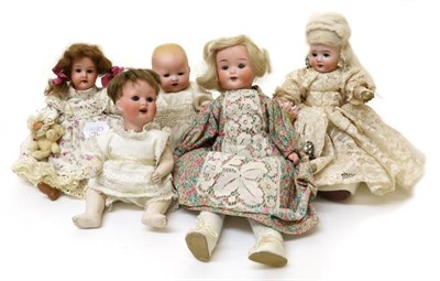 Lot 2004 - Assorted Bisque Dolls, including a German doll with sleeping blue eyes, open mouth, white wig,...