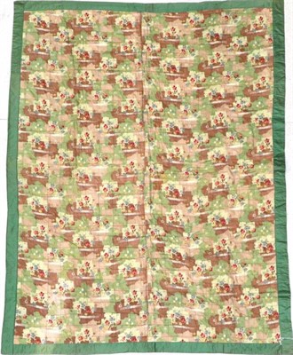 Lot 2023 - Circa 1930s Cotton Printed Quilt, with red, yellow and blue flowers, within a green satin type trim