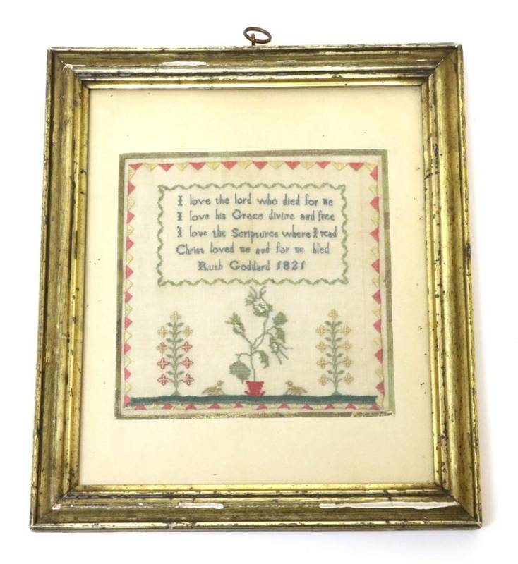 Lot 2084 - A 19th Century Sampler / Needlework, by Ruth Goddard, Dated 1821, featuring a religious verse...
