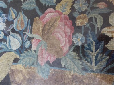 Lot 2088 - An 18th Century Needlework Panel, depicting a still life of flowers in a blue and striped bowl,...