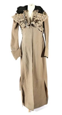 Lot 2097 - A Late 19th Century/Early 20th Century Grey Wool Riding Coat, with long sleeves and shaped...