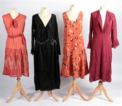Lot 2100 - Four Circa 1920s Day Dresses, comprising red sheer cotton sleeveless dress with embroidered...
